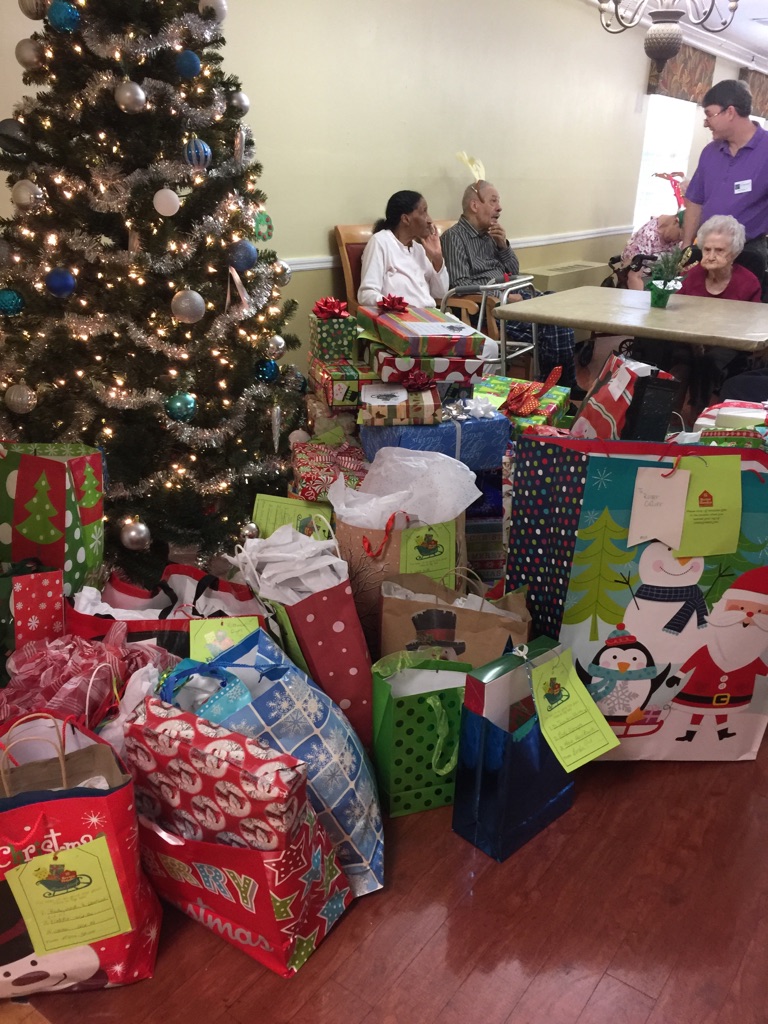 The residents at Cambridge Place await their gifts.